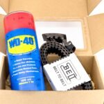 Automatinio diržo ir WD-40 puodelio dovanų rinkinys