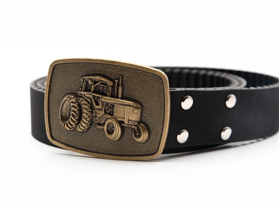 paskirstymo diržas su traktoriaus atvaizdo įspaudžiama sagtimi