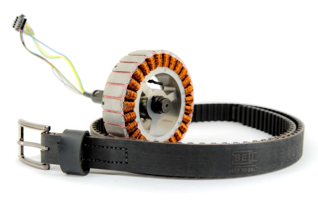 Motor with drive belt