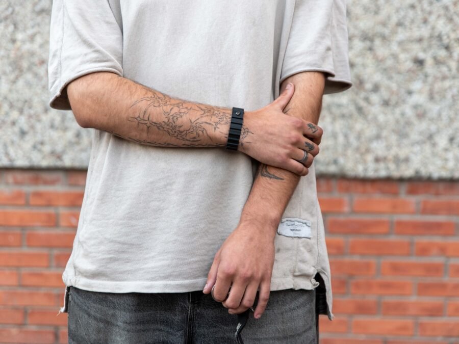 Model with arm tattoos