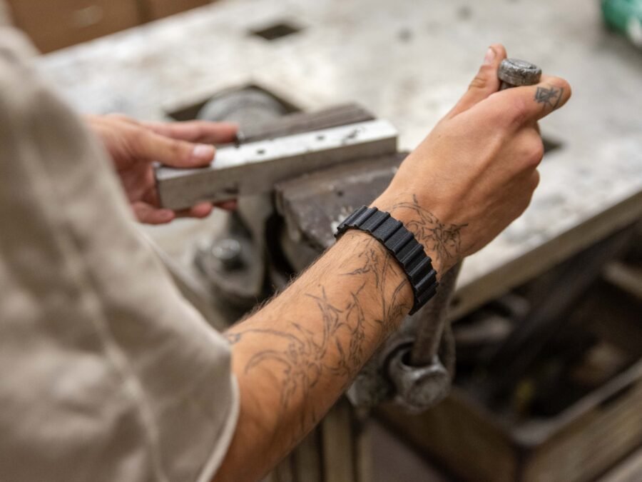 Tattooed arm with bracelet